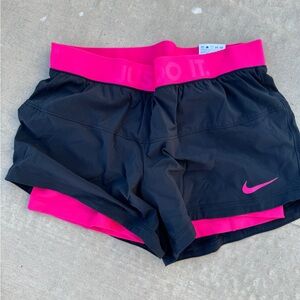 Nike dri fit running shorts with built in bike shorts.